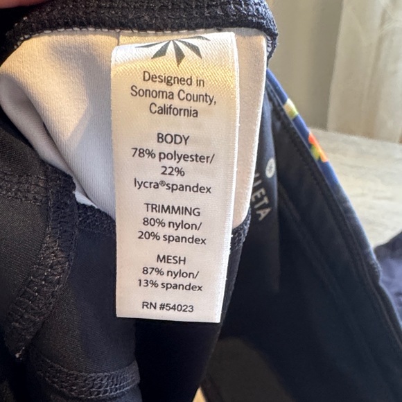 Women’s Athleta Tropical Precision 7/8 Ankle Leggings Navy Blue & Floral Design - Picture 3 of 6